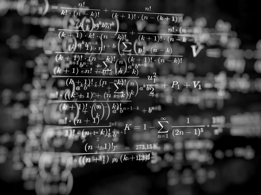 calculos e hipotesis en una pizarra